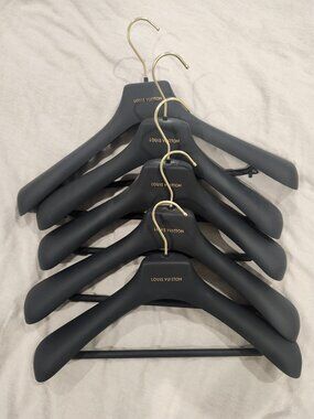 Set of 5 authentic Louis Vuitton hangers